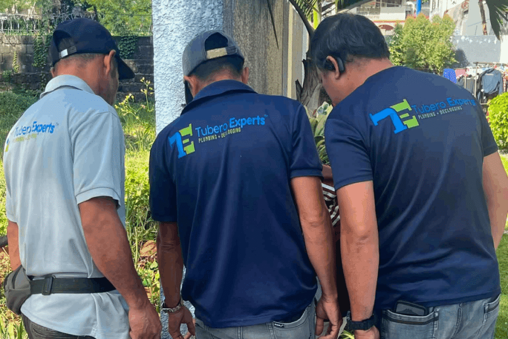 Tubero Experts plumbers conducting a site inspection in Muntinlupa.