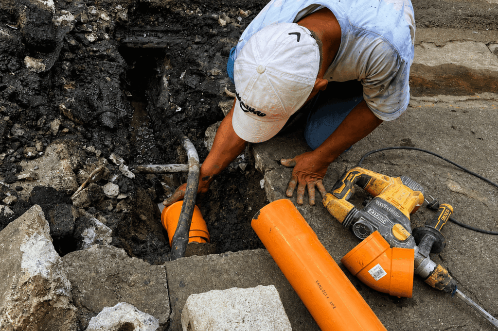 Tubero Experts technician performing Repiping of Sanitary Line during excavation