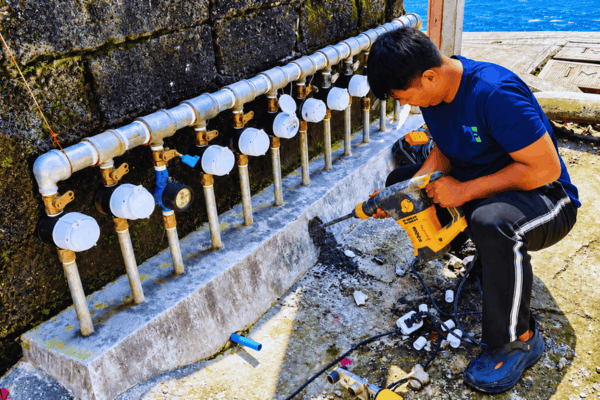 Setting up a bank of water meters takes careful drilling, alignment, and testing. We get each connection secure so every line reads accurately and stays leak-free.